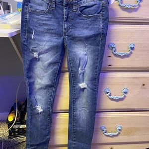 dark blue ripped jeans